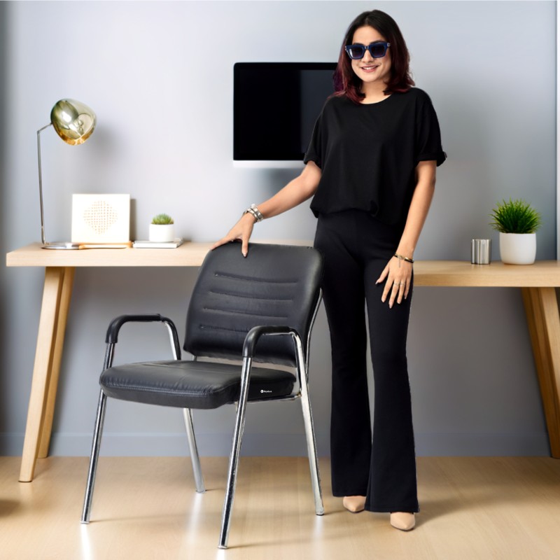 Goyalson office visitor chair features a sturdy chrome frame, comfortable cushioned seat and backrest, and supportive armrests, offering a reliable fixed seating solution without wheels.