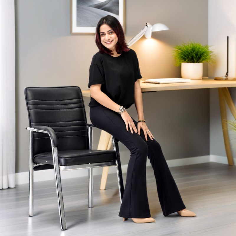 Goyalson office visitor chair is designed with a durable chrome frame, a well-padded seat and backrest, and sturdy armrests, providing a stable and dependable seating option without wheels.